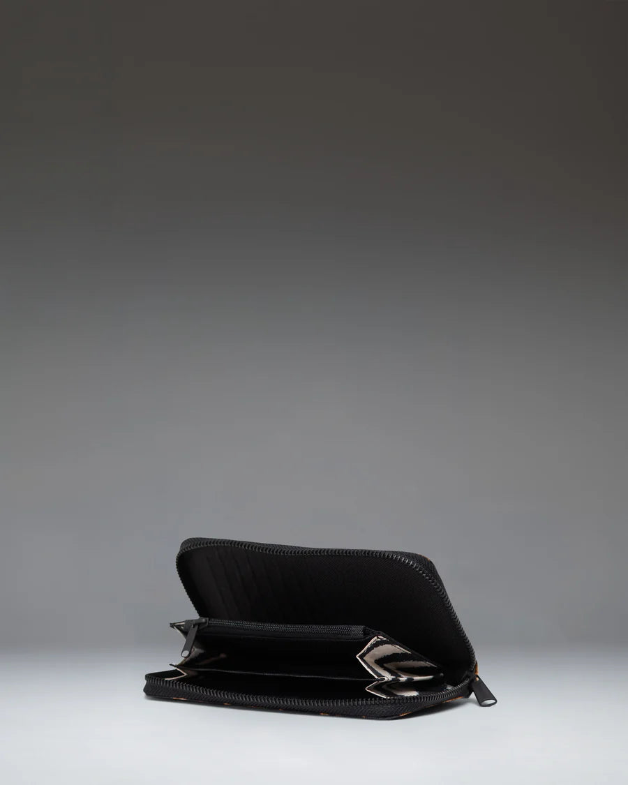 Cartera Herschel Thomas Digi Leopard Light