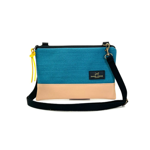 Bandolera Daniel Chong mini Impermeable beige y turquesa